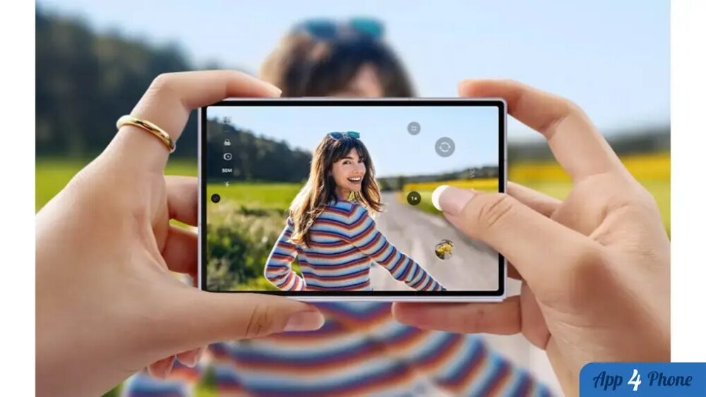 Personne tenant un smartphone pliable pour prendre une photo