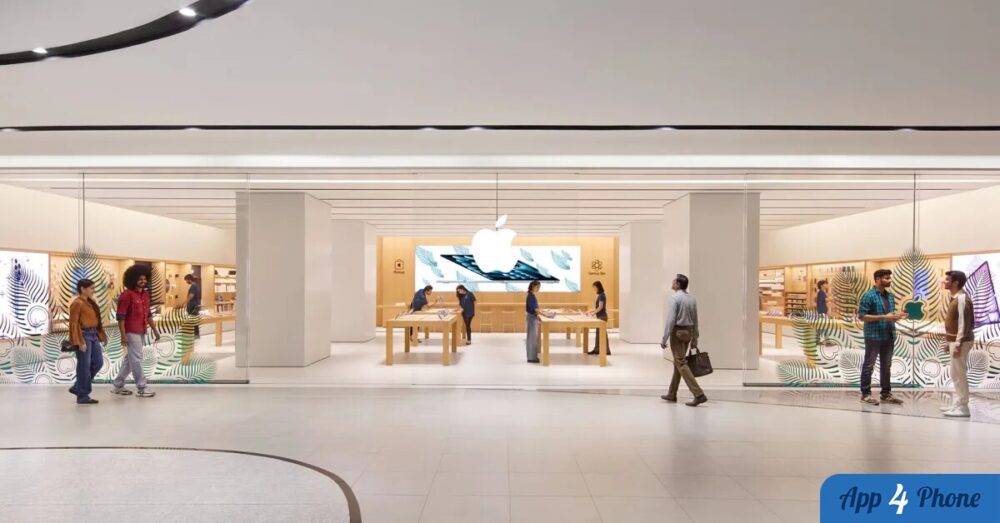 Intérieur d’un Apple Store avec produits exposés et visiteurs