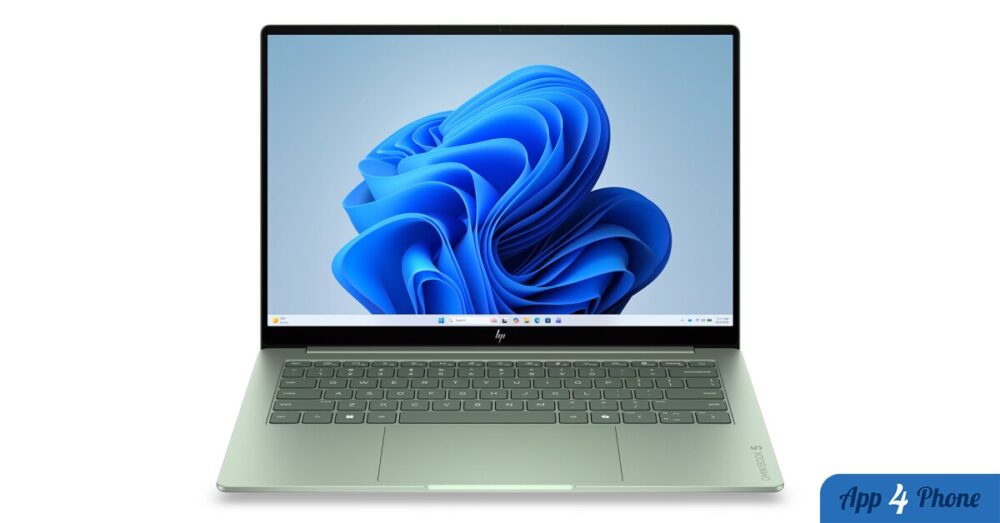 Ordinateur portable HP vert ouvert, affichant le fond d’écran Windows 11