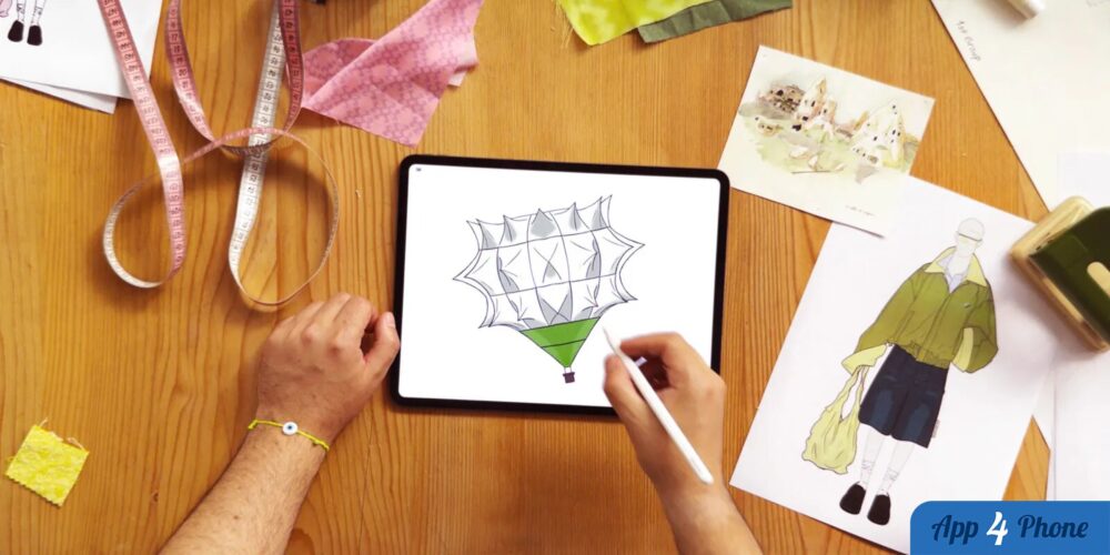 Créateur esquissant un ballon coloré sur une tablette