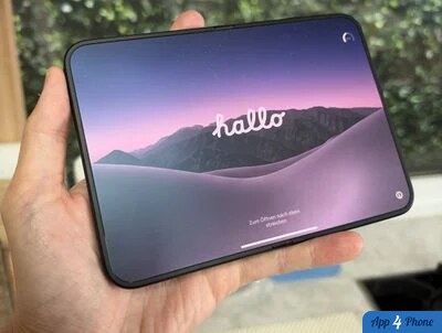 Écran intérieur du iPhone Duo affichant un fond d’écran montagneux