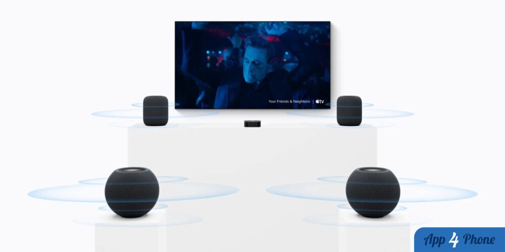 Deux HomePod entourent un téléviseur dans une configuration home cinéma