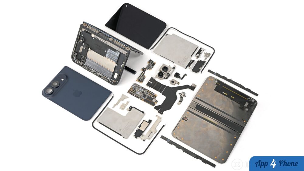 iPhone Duo démonté, avec ses composants répartis sur une table