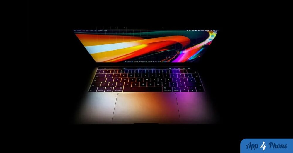 MacBook Pro ouvert affichant un écran aux couleurs vives